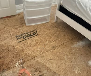 image of wood before floor repration